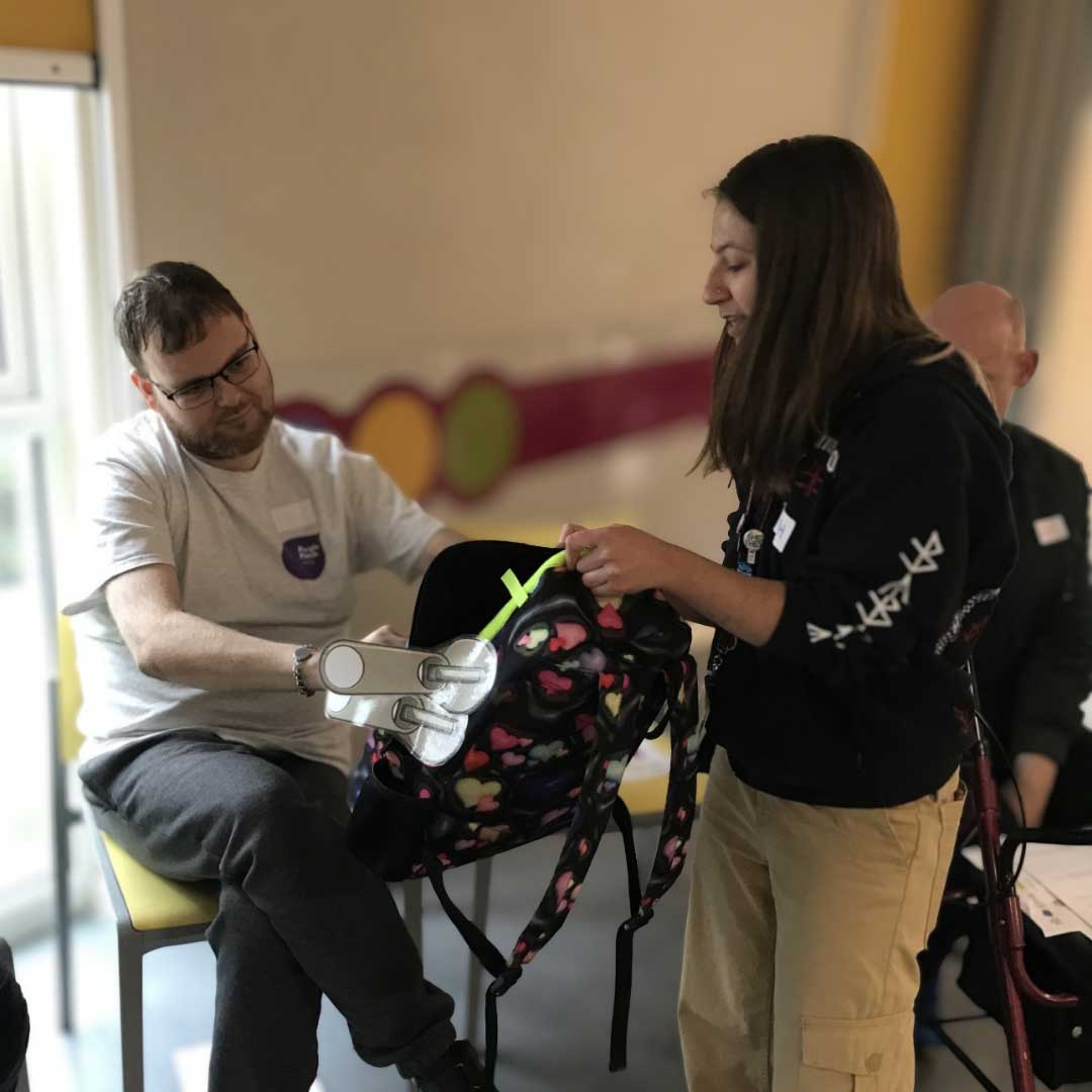 BM-training-client Beth from our team, training a client for the Travel with Confidence Project.